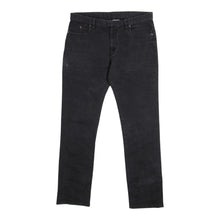 Load image into Gallery viewer, Maison Margiela S/S&#39;16 Black Wash Jeans Size 34
