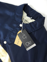 Load image into Gallery viewer, Universal Works Clo Insulated Coach Jacket Navy/Gold Medium
